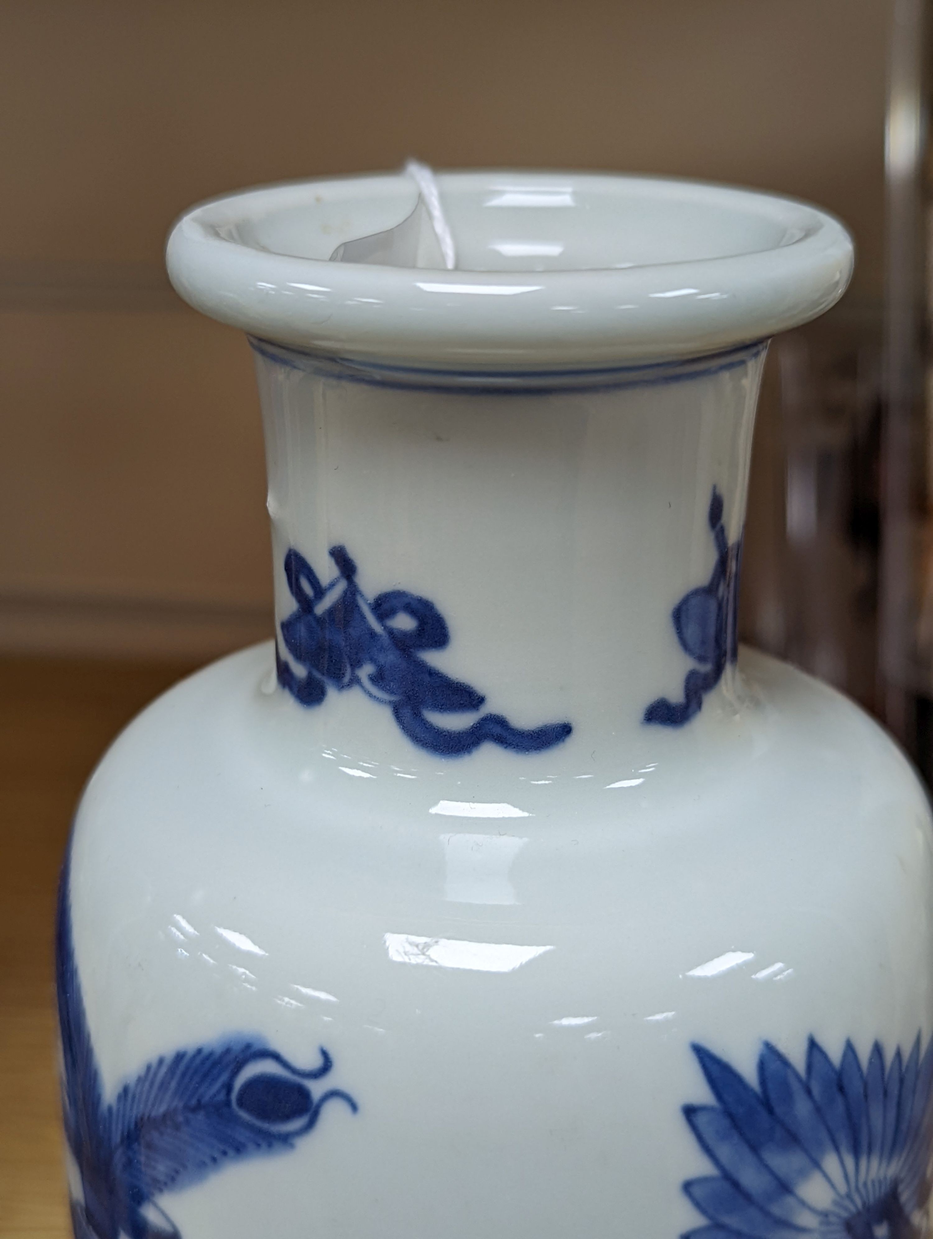 A Chinese blue and white ‘Antiques’ vase, 19.5 cms high.